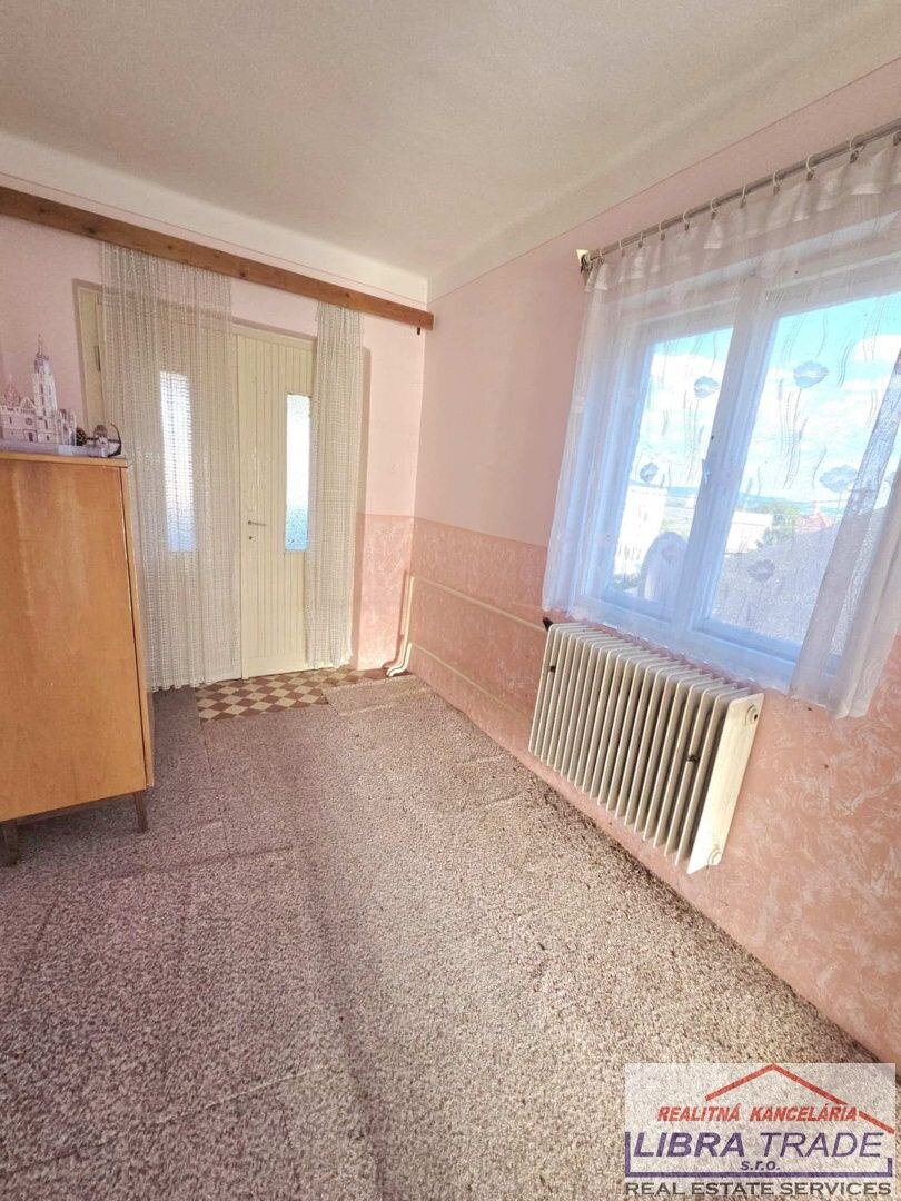 PREDAJ poschodový rodinný dom v obci Pastovce s pekným pozemkom. ODPORÚČAME. — foto 14
