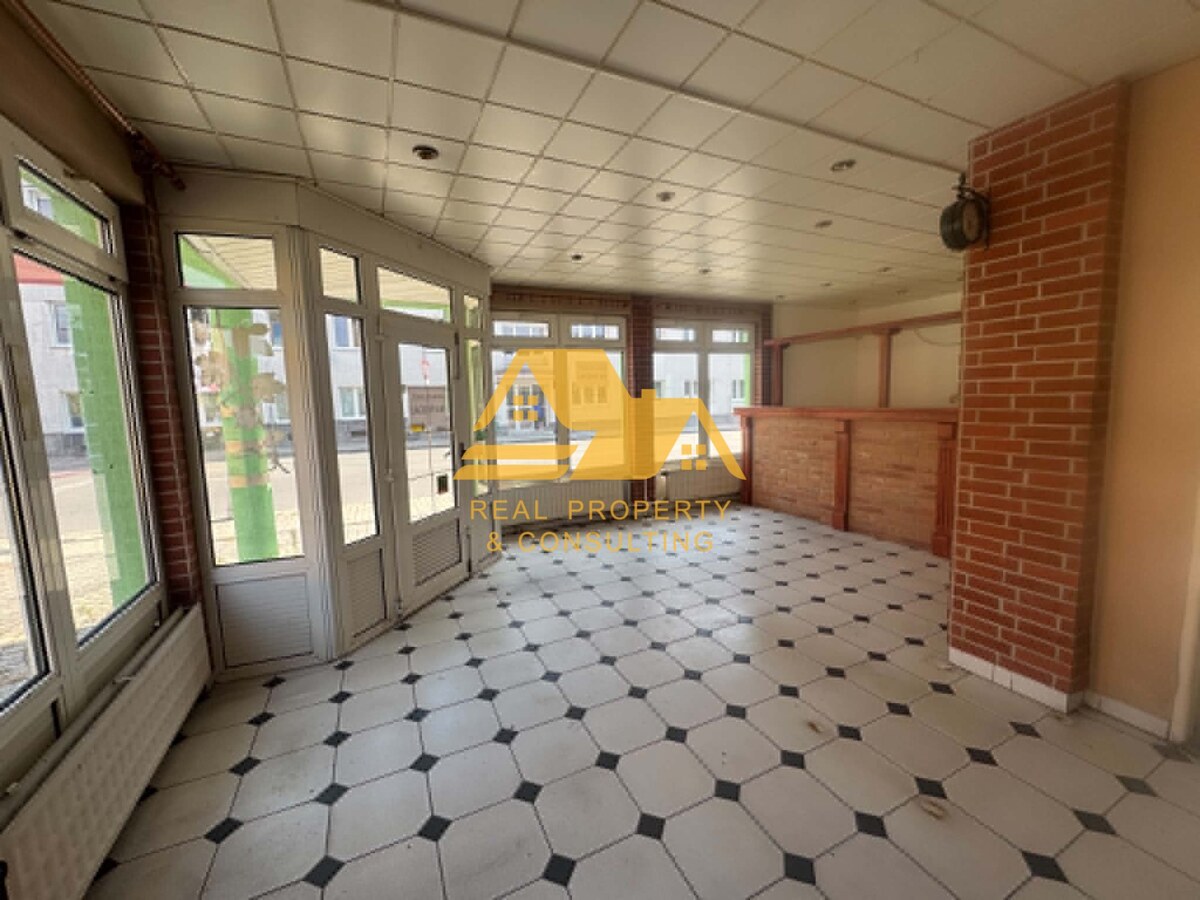 Predám budovu s obchodným duchom v centre Nových Zámkov — foto 3