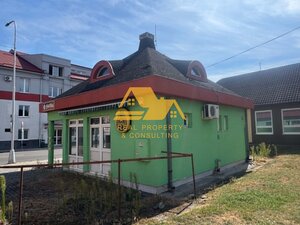 Predám budovu s obchodným duchom v centre Nových Zámkov — foto 1