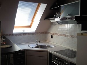 Prenájom 4 izbový podkrovný byt v centre mesta. — foto 1