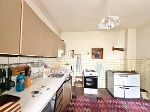 Priestranný rodinný dom v Rudne s veľkým potenciálom — foto 11