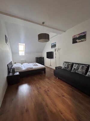Štýlový 2-izbový apartmán s výhľadom na Tatry vo Veľkej Lomnici — foto 5
