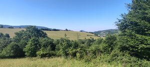 Slnečný pozemok 7 928 m² v Hornom Vadičove s výnimočným potenciálom — foto 1