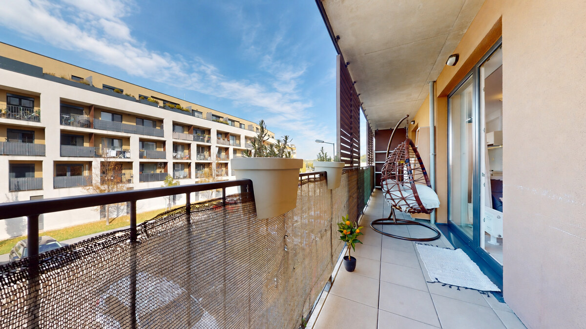 SLNEČNICE – VILADOMY | Svetlý 2-izbový byt s 25 m² terasou na predaj — foto 4