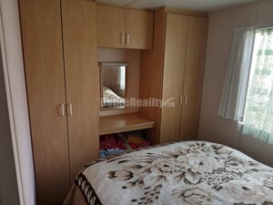 Parádny pozemok s mobilným domom na predaj — foto 1