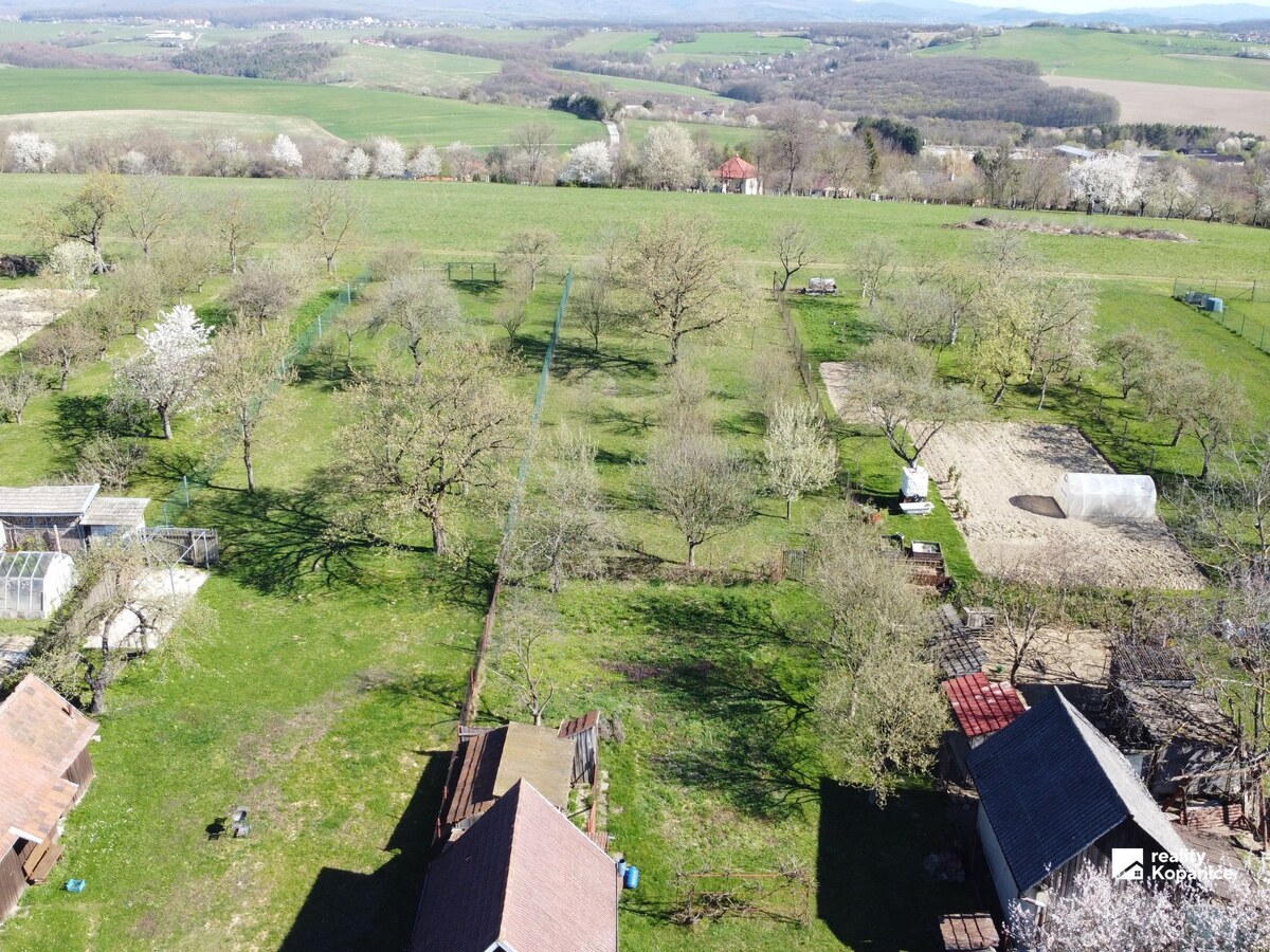 Rodinný dom s veľkým pozemkom a krásnym výhľadom — foto 25