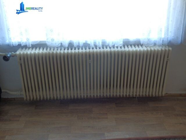 Rodinný dom v obci Poniky na rovinatom pozemku 705 m² — foto 8