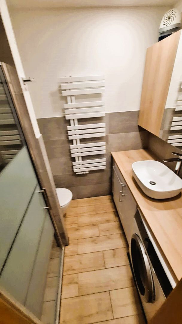 Rezervované...TOP/ Rybany - 2 izbový byt s loggiou a s garážou — foto 10